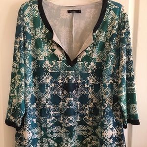 Jete. Blouse in green, blues & white.